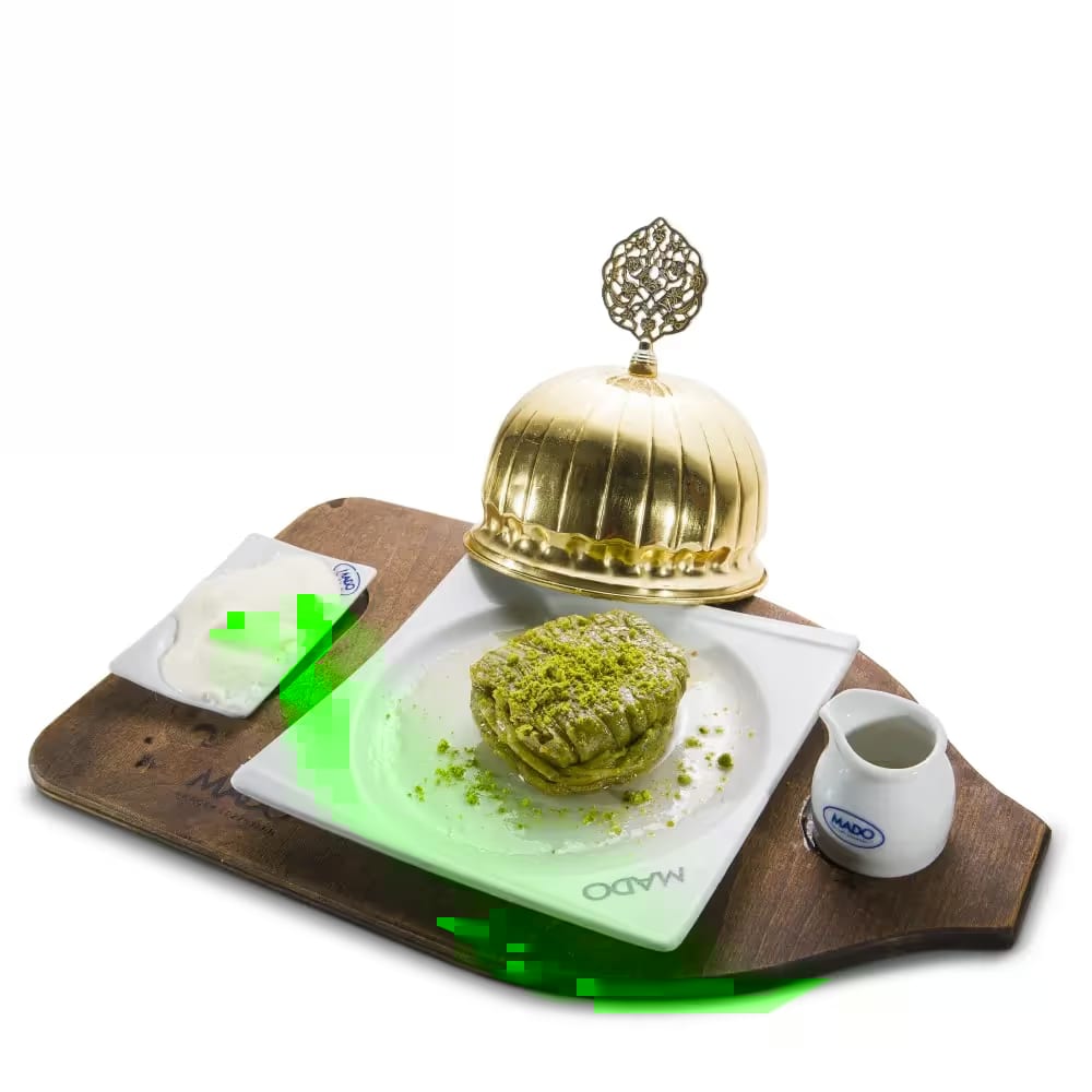 A MADO pistachio dondurma, hand-stretched and served